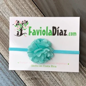 Vincha Celeste con Flor Brandy