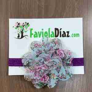 Vincha Morada con Flor Celeste Estampada