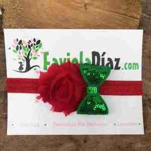 Vincha con Flor Roja y Lazo Verde Caridad
