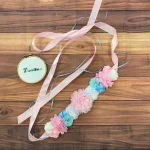 Cinturón Maternal para Revelación de Sexo con Flores Rosadas, Celeste y Blancas