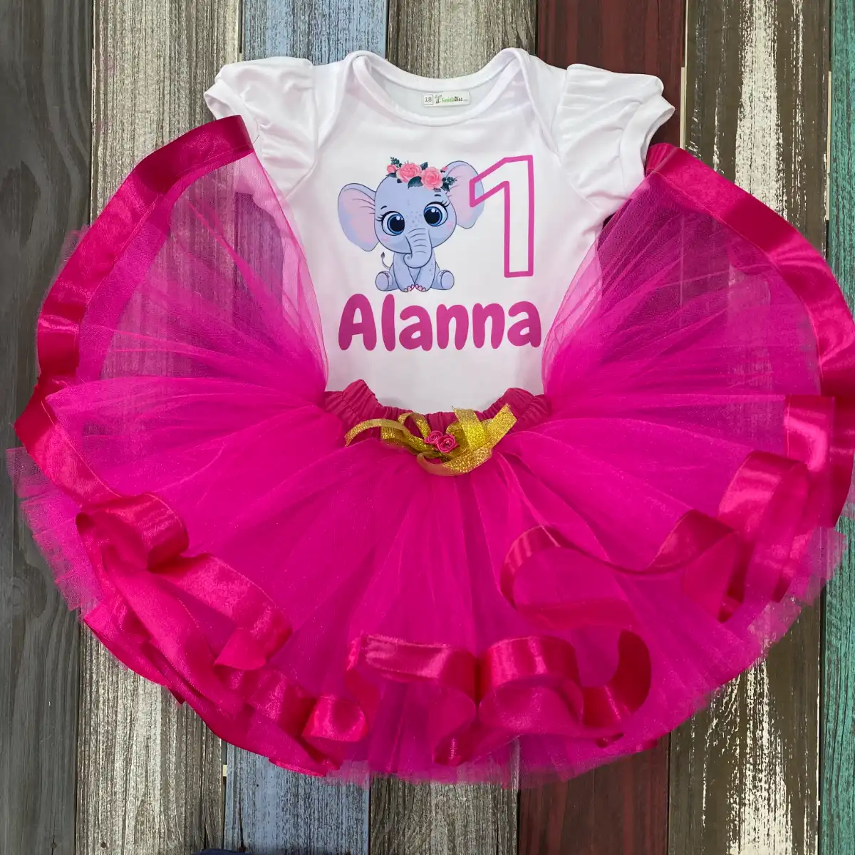 Set de Tutu Fucsia y Mameluco con Mangas Bombachas de Elefante 1 Set de Tutu Fucsia y Mameluco con Mangas Bombachas de Elefante