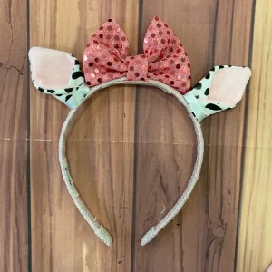 Diadema Blanca y Negra con Orejitas de Vaca y Lazo Rosado de Lentejuelas