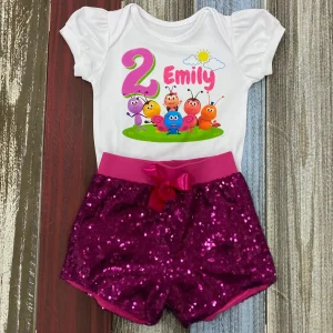 Set de Short Fucsia de Lentejuelas y Mameluco con mangas Bombachas alusivo a Bichikids