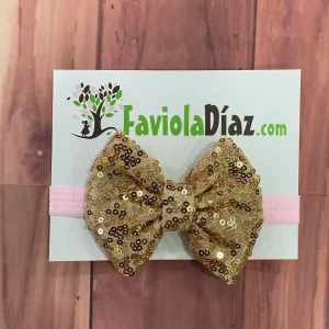 Vincha Rosada con Lazo Dorado de Lentejuelas Alondra